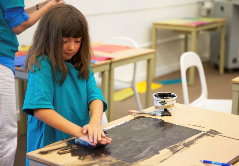 Grandparents and grandchildren worked together to design their own Moleskine-style notebook or journal with a personalized touch in the Book Binding and Paper Crafting Class taught by Elsi Vassdal Ellis. Photo by Mariko Osterberg / WWU Communications and 