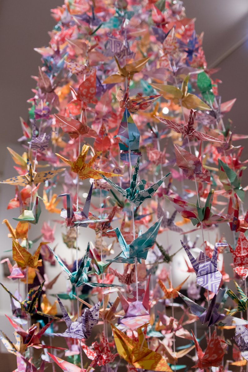 a display of paper origami cranes