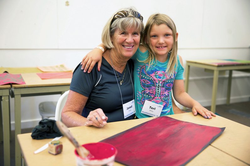 Grandma Janet Wiley and granddaughter Teri Wiley pose for a portrait during Grandparents University on Thursday, July 16, 2015. “This is my first time at Grandparents U, she’s only six-years-old, so I was a little nervous , but it’s really nice grandparen