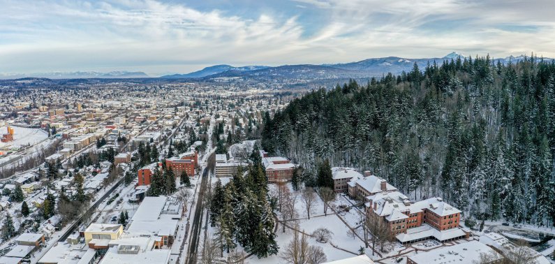 High above campus looking north over a snow-covered Bellingham