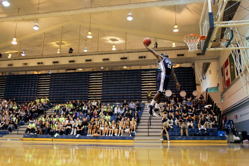WWU basketball player Shedrick Nelson slams down a one-handed jam during the Viking Jam at Carver Gym on Wednesday, Oct. 26, 2011. Photo by Rhys Logan | University Communications intern