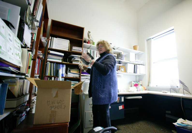 <p>
	Elva Giddings, interim director of Prevention and Wellness Services on the fifth floor of Old Main, cleans her office, which was the epicenter of the disaster. Tuesday night, a pipe burst in the ceiling above her office and flooded much of the build