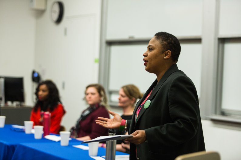 WWU professor Tara Perry introduces a panel of women veterans at a special event Tuesday, March 1, on the WWU campus. Photo by Rhys Logan / WWU