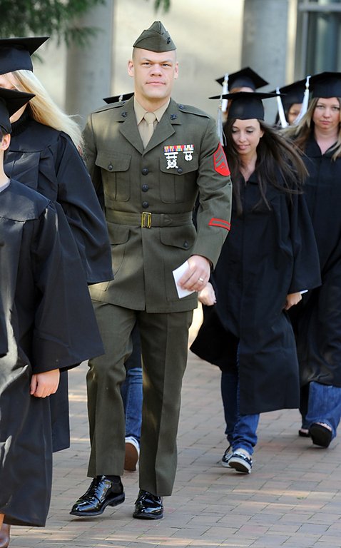 Sgt. Jason Graham of the United States Marine Corps, walks to Sam Carver Gymnasium for WWU's 2010 Winter Commencement on March 20, 2010. In his own words, Graham say he "chose to wear my uniform to graduation because I wanted show my love and appreciation
