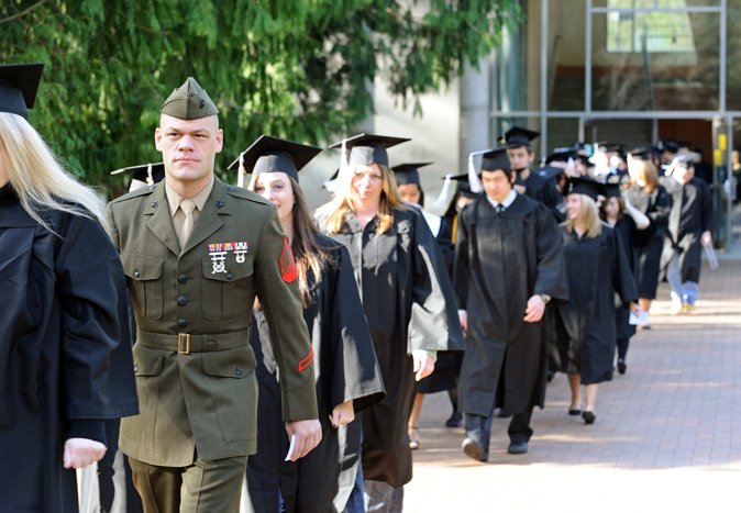 Sgt. Jason Graham of the United States Marine Corps, walks to Sam Carver Gymnasium for Western Washington University's 2010 Winter Commencement on March 20, 2010. Sgt. Graham joined the Marine Corps in 2004 and has three months left to complete his obliga