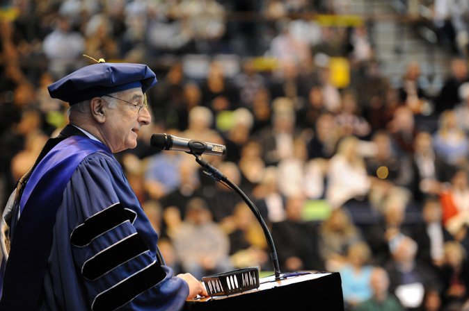 University Marshal Daniel Larner, president of the WWU Faculty Senate, gives the opening remarks during Western Washington University's 2010 Winter Commencement at Sam Carver Gymnasium on March 20, 2010.

Photo by Rachel Bayne of Bayne Photography | for