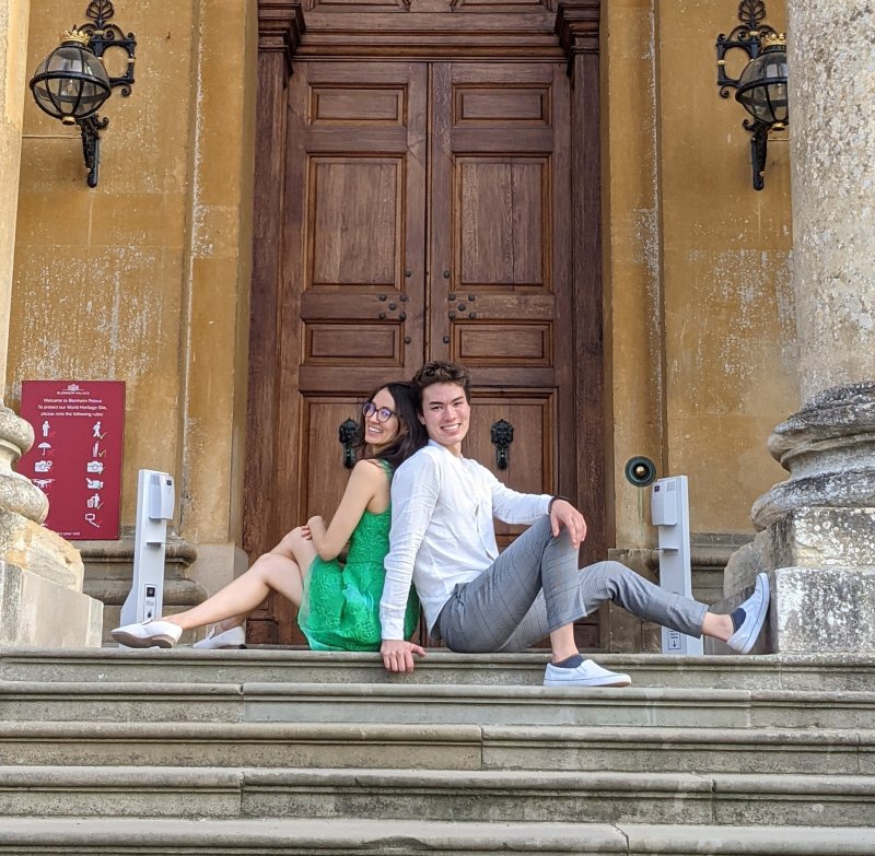 Nate Jo and sister Jenny Jo Rallens sit atop the steps of Blenheim Palace near Oxford University.