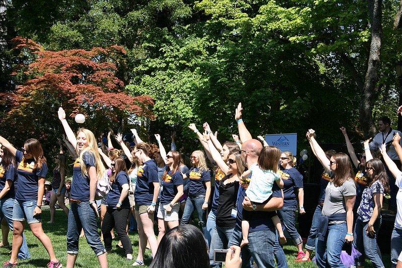 Back2Bellingham workers and volunteers dance in a flash mob at the 2012 event on campus. Courtesy photo