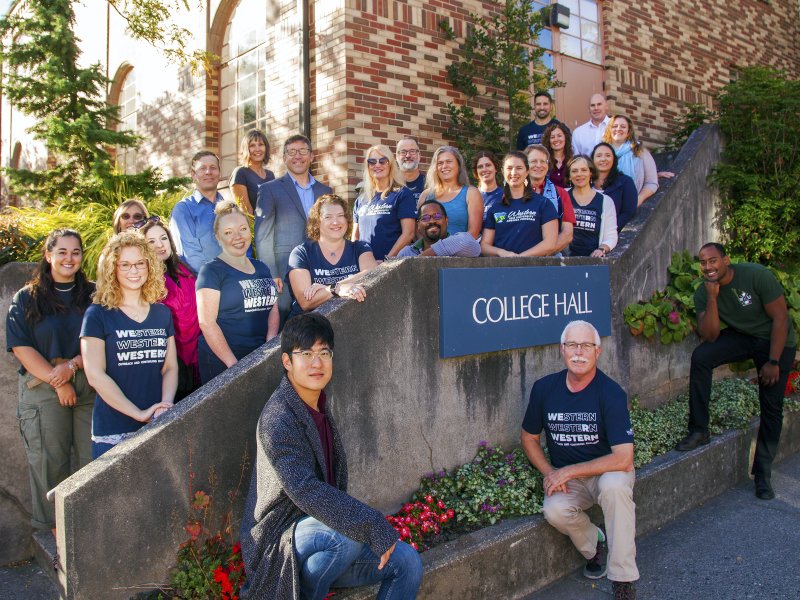 OCE staff poses in front of College Hall