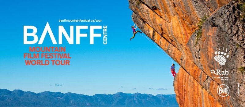 A woman dangles out over the edge of a rock ledge; to the left of her are the words" Banff Film Festival World Tour"