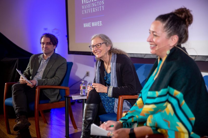 Speakers and the moderator respond to the audience at the Meyerhoff Lecture on April 7.