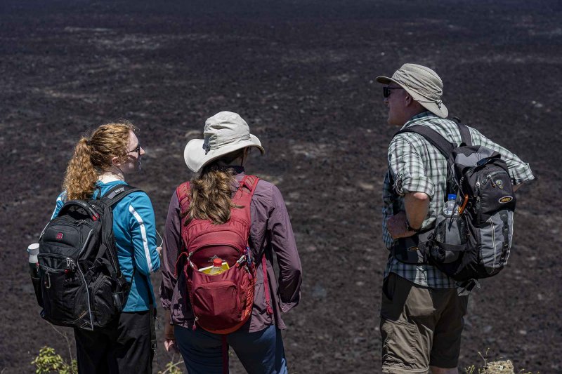 Scott and two students peer out over the caldera of Sierra Negra volcano