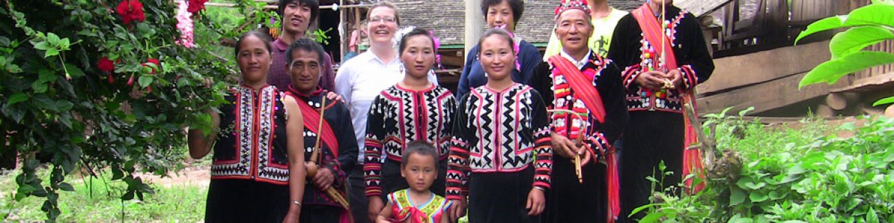 Judy Pine, an assistant professor of anthropology at Western Washington University, stands with a group of Lahu speakers in China. Courtesy photo