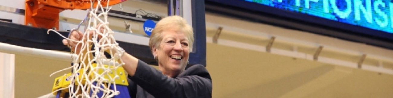 Lynda Goodrich, Western Washington University's athletic director for 26 years, cuts down the net after the men's basketball team's national title in 2012. Goodrich recently was named winner of the NCAA D2 ADA Lifetime Achievement Award. Courtesy photo