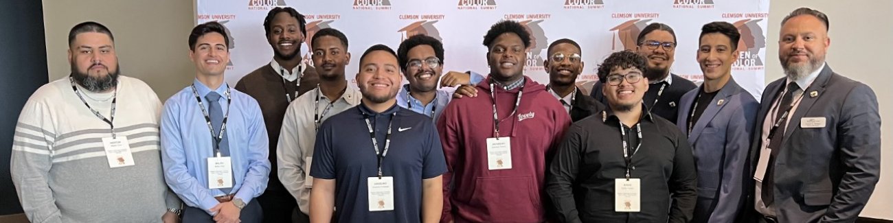 Students attending the Men of Color Summit pose for a picture at the event
