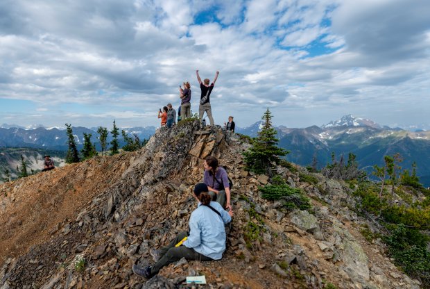 Students observe 360 views of the Cascades after hiking up Tamarack Peak.