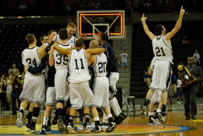 The Western Washington University men's basketball team celebrates after winning the school's first national basketball title, 72-65 over the University of Montevallo. Courtesy photo