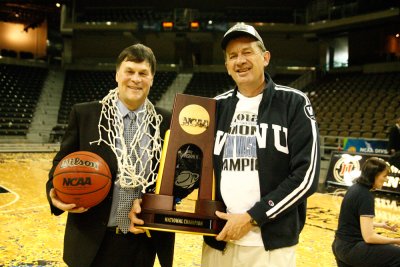Coach Brad Jackson poses with Western President Bruce Shepard and the NCAA DIv. II national championship trophy. Courtesy photo