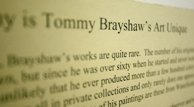 Nine original paintings from artist and conservationist Tommy Brayshaw are currently on display in Wilson Library near the north end of the skybridge. Photo by Matthew Anderson | WWU