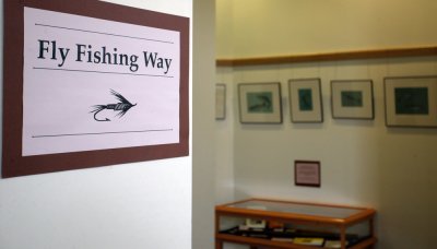 Nine original paintings from artist and conservationist Tommy Brayshaw are currently on display in Wilson Library near the north end of the skybridge. Photo by Matthew Anderson | WWU