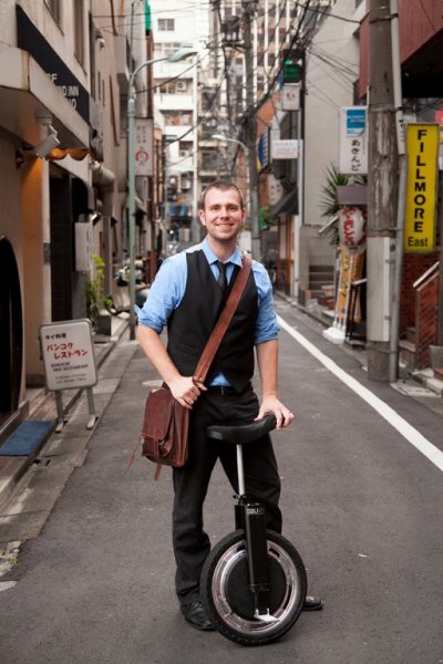 Western alumnus David Martschinske poses with his company's self-balancing unicycle in Japan. He will appear on tonight’s episode of ABC’s Shark Tank in hopes of securing an investment deal for the invention. Courtesy photo