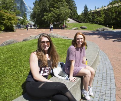 Seniors Haley Basim and Megan Stark relax in the sun in between classes