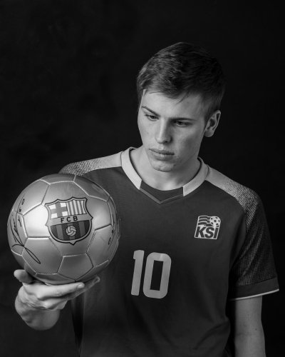soccer player stares at soccer ball
