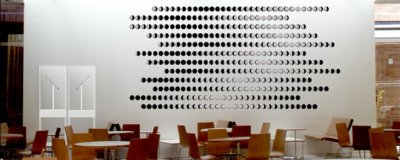 The "Lunar Drif" sculpture features digital images of the moon and the daytime sky that accompany mechatronic elements that will constantly point at the moon and to the sun, wherever they are located, lending a continual presence to the entire path of the