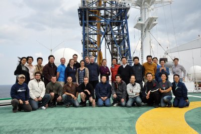 The entire science party poses for a photo on the Chikyu's helicopter deck. Photo courtesy of Beth Novak