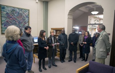 Sarah Clark-Langager, director of the Western Gallery, speaks at a ceremony to unveil a painting by Cuban artist Salvador Gonzalez Escalona, donated by to Western by English professor Rosanne Kanhai. Photo by Matthew Anderson | WWU Communications and Mark
