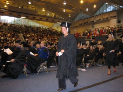 Viva Barnes walks to the front of Carver Gymnasium during Commencement exercises on Dec. 12.