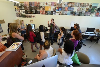 Evan Abell, the photo editor for Klipsun Magazine during summer quarter, tells about shooting for Klipsun and The Western Front during the summer 2014 WJEA camp. File photo by Pete Kendall, Centralia High School journalism adviser and Western journalism a