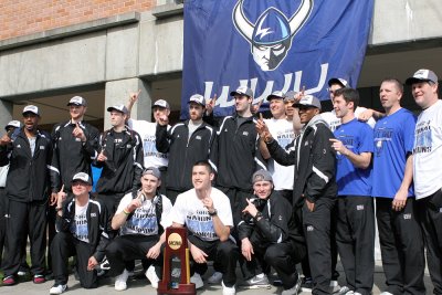 The Western Washington University men's basketball team, newly crowned NCAA Div. II champions, pose for a group photo on the Western campus Sunday, March 25, 2012. A large group of fans welcomed the team home from Kentucky. Photo courtesy of Lillian Furlo