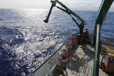 A seismometer is hoisted overboard