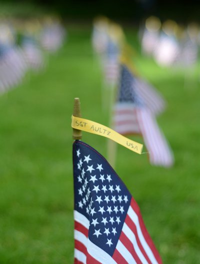 Veterans Outreach Center members have placed 146 flags on the lawn to represent the 146 Washington residents who have been killed in Operation Iraqi Freedom and Operation Enduring Freedom. Photo by Mindon Win / WWU Communications and Marketing intern