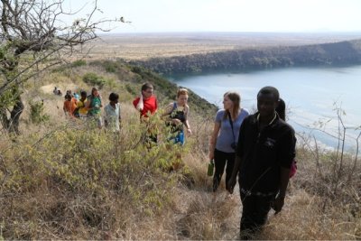 After breakfast, Tuesday, Aug. 13, the students took a nice hike overcoming treacherous acacia trees to reach a pretty view point of Lake Chala and the savannah.  This trip turned into a brief visit to Kenya, seeing as the Tanzania/Kenya border went right