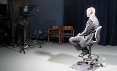 Dennis Madsen, chair of the WWU Board of Trustees, films a video in the Video Services television studio. Photo courtesy of ATUS Video Services.