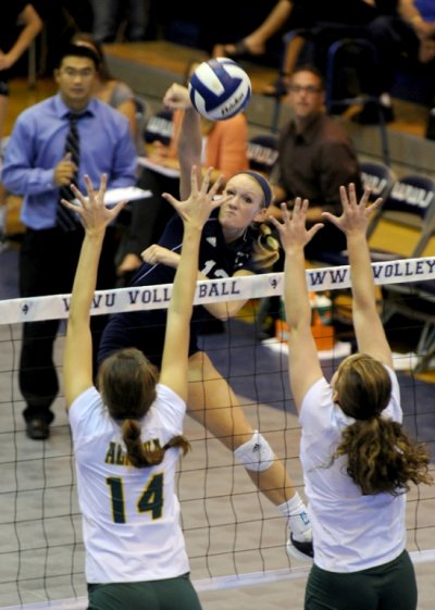 Marylayna Geary spikes the ball in a recent volleyball match in Carver Gymnasium on the WWU campus.