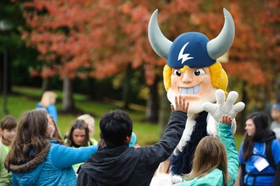 Victor E. Viking greets students as they enter Carver Gymnasium during tour day 2012. File photo by Rachel Bayne / for WWU